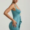 Zivanka Slinky Jersey minijurk met uitsnijdingen en ruches in zeegroen